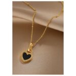 ⁦سلسال ذهبي بتصميم قلب وجهين بلون أبيض وأسود⁩ - الصورة ⁦2⁩