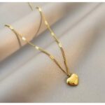 سلسال ناعم ذهبي بتصميم قلب مع عباره love