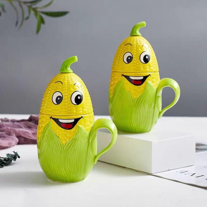 103375088_67dc641317955 مج (كوب ) مع غطاء لون أصفر بتصميم ذرة - الصورة 1