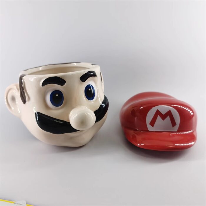 ⁦مج (كوب ) مع غطاء لون أحمر وبيج بتصميم ماريو⁩ - الصورة ⁦6⁩