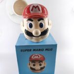 ⁦مج (كوب ) مع غطاء لون أحمر وبيج بتصميم ماريو⁩ - الصورة ⁦7⁩