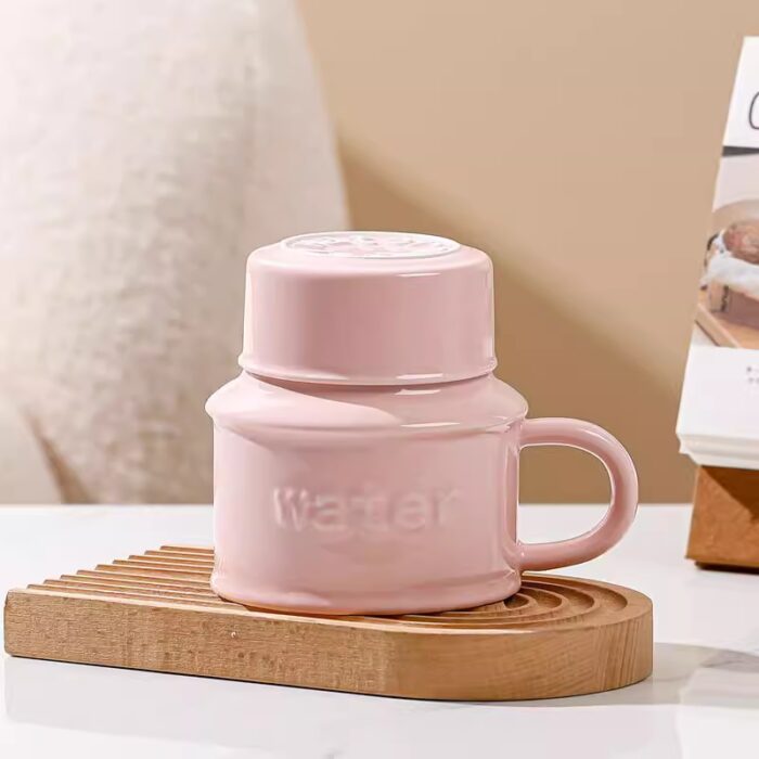 ⁦مج (كوب ) مع غطاء لون زهري بتصميم Water⁩ - الصورة ⁦6⁩