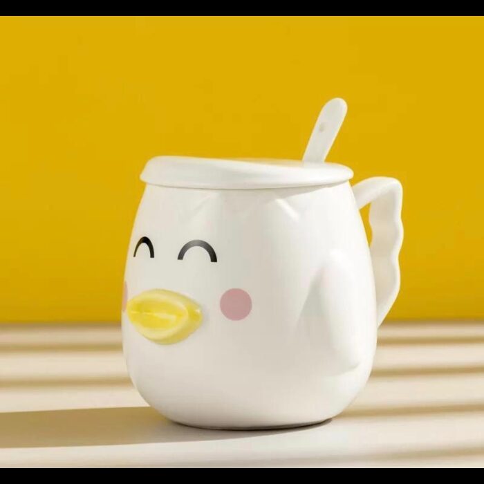 ⁦مج (كوب ) مع غطاء وملعقة لون أبيض بتصميم بطة⁩ - الصورة ⁦5⁩