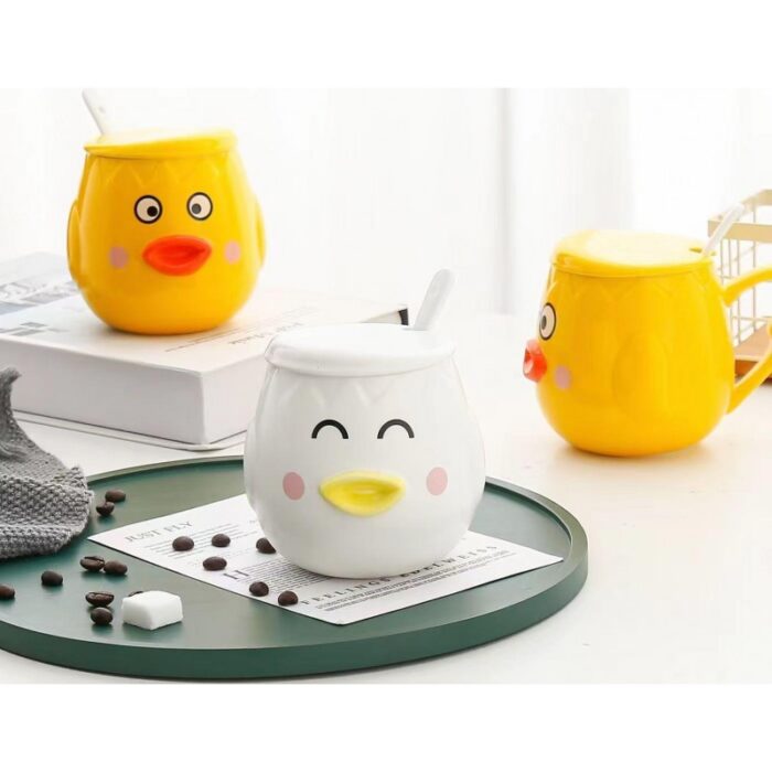 103375096_67dc64232d0b3 مج (كوب ) مع غطاء وملعقة لون أصفر بتصميم بطة - الصورة 1