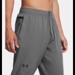 ⁦Under Armour Men's UA Unstoppable Tapered Pants- بنطلون اندر ارمور انستوببال تيبرد للرجال لون رمادي⁩ - الصورة ⁦4⁩