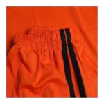 ⁦طقم رياضي (تيشيرت وبنطال) للأطفال لون برتقالي⁩ - الصورة ⁦2⁩