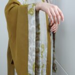 ⁦عباية مفتوحة لون زيتي وبيج⁩ - الصورة ⁦9⁩