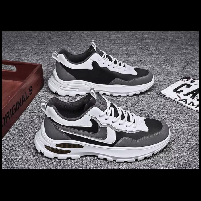 ⁦حذاء رياضي للرجال لون أسود ورمادي ونعل أبيض⁩ - الصورة ⁦6⁩