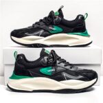 ⁦حذاء رياضي للرجال لون أسود وأخضر ونعل أبيض⁩ - الصورة ⁦2⁩