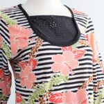 ⁦بجامة بأكمام طويلة بتصميم نقشة مغربية ورد مخطط عرضي لون برتقالي وأسود⁩ - الصورة ⁦4⁩