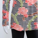 ⁦بجامة بأكمام طويلة بتصميم نقشة مغربية ورد مخطط عرضي لون برتقالي وأسود⁩ - الصورة ⁦5⁩