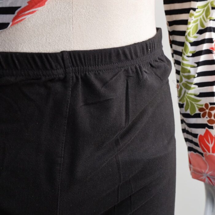 ⁦بجامة بأكمام طويلة بتصميم نقشة مغربية ورد مخطط عرضي لون برتقالي وأسود⁩ - الصورة ⁦6⁩