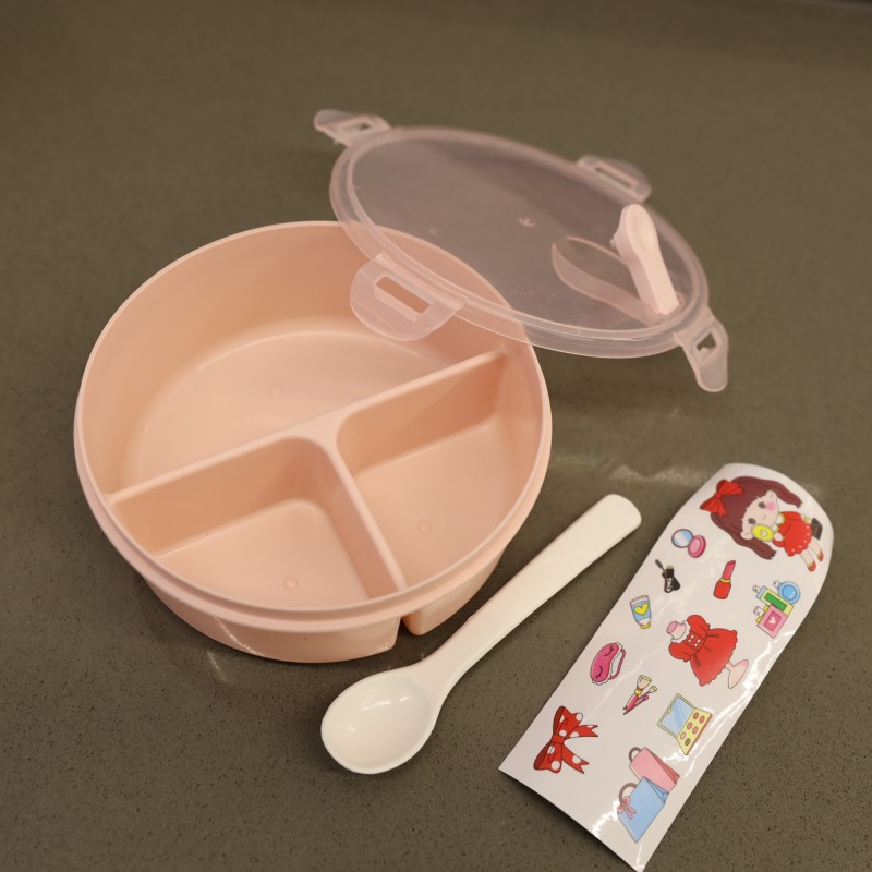 1033753163_67dc71b2190ca لانش بوكس بلاستيك مع ملعقة بتصميم دائري قطر 15 سم لون زهري - الصورة 1