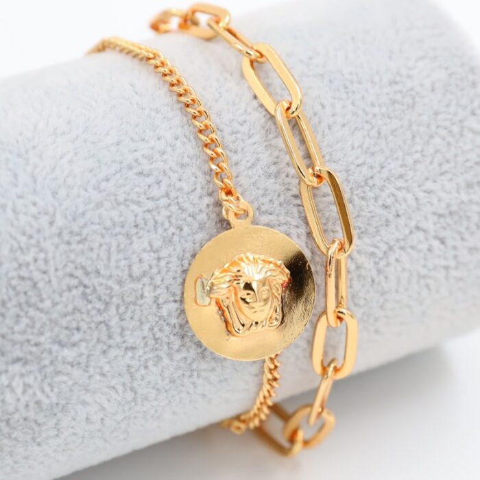 1033753653_67dc75194d89d سوار ذهبي طبقتين بتصميم فرزاتشي دائرة - الصورة 1