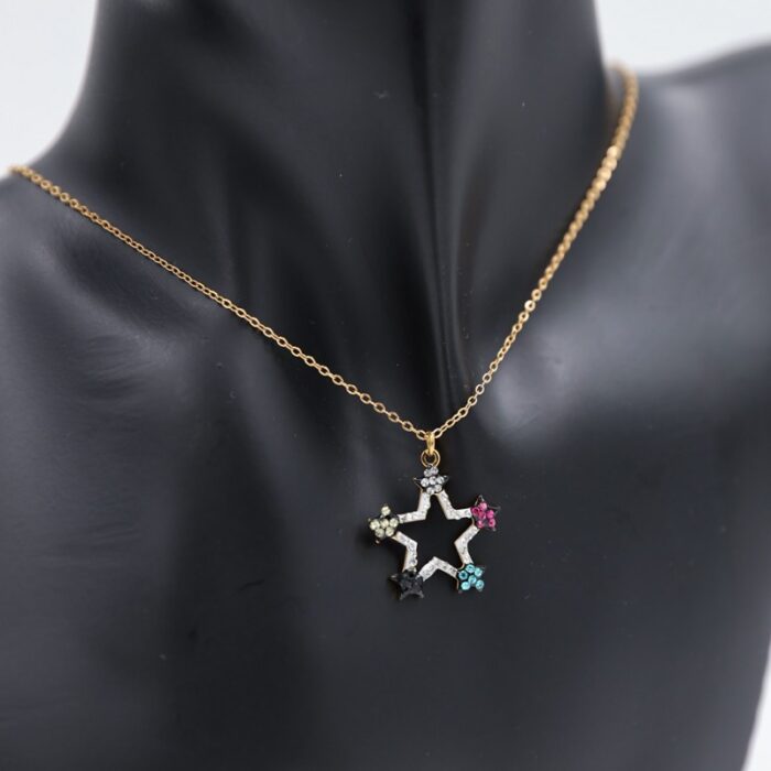 1033753656_67dc751b997af سلسال ذهبي بتصميم نجمة مع زركون ملون - الصورة 1
