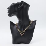 سلسال ذهبي بتصميم جنزير ونجمة زركون ملون