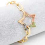 سوار ذهبي بتصميم نجمة زركون ملون