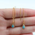 حلق ذهبي بتصميم دمعة زركون فيروزي