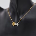 ⁦سلسال ذهبي بتصميم لعبة تركيب⁩ - الصورة ⁦2⁩