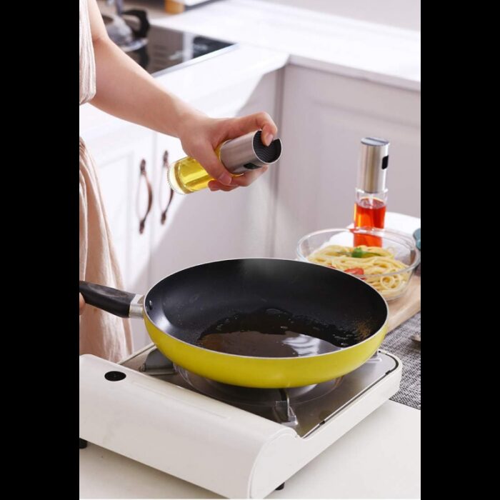 ⁦عبوة زيت بخاخ حجم 100 مل⁩ - الصورة ⁦2⁩