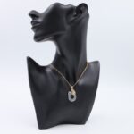 سلسال ذهبي بتصميم قل على شكل دائري - سورة الفلق