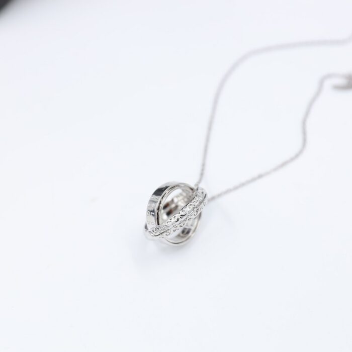 ⁦سلسال فضي بتصميم 3 خواتم⁩ - الصورة ⁦4⁩