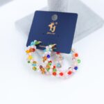 حلق ذهبي بتصميم لولو وخرز ملون