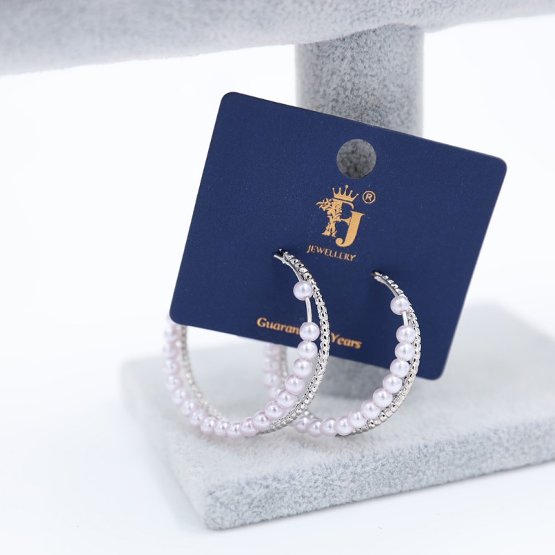 ⁦حلق فضي طبقتين بتصميم دائري مع لولو⁩ - الصورة ⁦1⁩