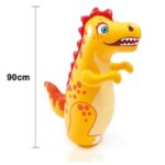 ⁦كيس ملاكمة قابل للنفخ للأطفال بتصميم ديناصور لون اصفر مقاس 94x61 سم- يتم تعبئته بالقليل من الهواء ثم وضع بعض الماء بداخله  حتى يثبت، ثم يتم ملئه بالهواء⁩ - الصورة ⁦3⁩