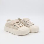 حذاء برباط ولاصق بلمعة للأطفال لون أسود و أبيض