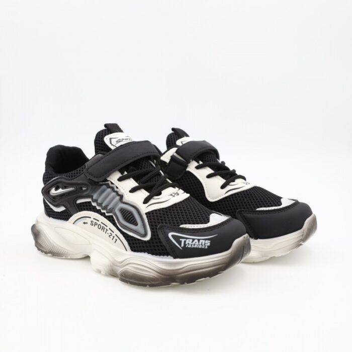 103376424_67dca3fb5e4aa بوت رياضي بناتي للأطفال لون أسود وأبيض - الصورة 1