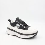 ⁦حذاء رياضي للجنسين لون أسود و أبيض⁩ - الصورة ⁦2⁩