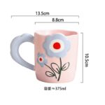 ⁦مج بتصميم وردة يد عريضة لون زهري⁩ - الصورة ⁦5⁩