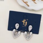 حلق فضي بتصميم قلب منفوخ حجم وسط