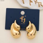 حلق ذهبي بتصميم لوزتين منفوخة كبيرة وصغيرة