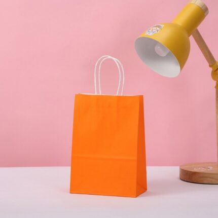 باكيج 12 كيس ورقي للهدايا لون برتقالي قياس 21*27سم