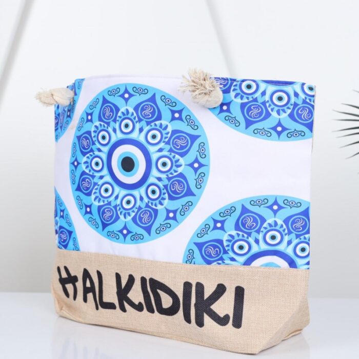 ⁦شنطة يد قماش للرحلات بتصميم عين لون أبيض⁩ - الصورة ⁦2⁩