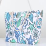 ⁦شنطة يد قماش للرحلات بخرفة بحرية لون أبيض⁩ - الصورة ⁦2⁩