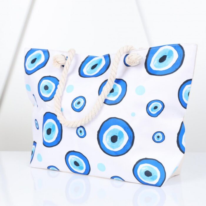 ⁦شنطة يد قماش للرحلات بتصميم عيون لون أبيض⁩ - الصورة ⁦2⁩