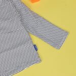 ⁦بلوزة بأكمام طويلة للأطفال لون ابيض واسود⁩ - الصورة ⁦6⁩