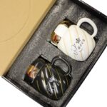 ⁦طقم فناجين مع غطاء عدد 2 لون أسود و أبيض⁩ - الصورة ⁦3⁩