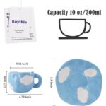 ⁦فنجان مع صحن لون أزرق بتصميم غيوم⁩ - الصورة ⁦2⁩