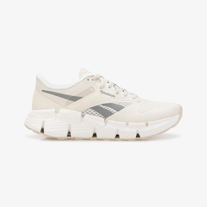 ⁦Reebok Womens' Zig Dynamica 5 Shoes - حذاء ريبوك زيج دايناميكا 5 للنساء لون طحيني وبرتقالي⁩ - الصورة ⁦2⁩