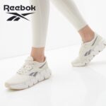 ⁦Reebok Womens' Zig Dynamica 5 Shoes - حذاء ريبوك زيج دايناميكا 5 للنساء لون طحيني وبرتقالي⁩ - الصورة ⁦11⁩