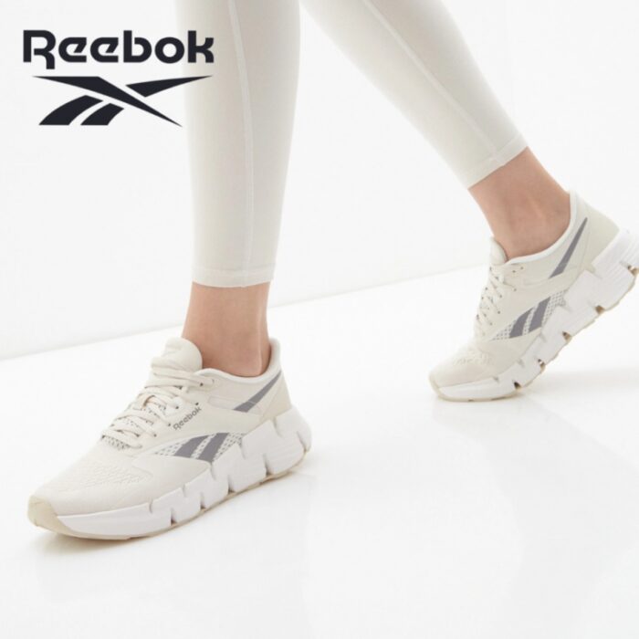 ⁦Reebok Womens' Zig Dynamica 5 Shoes - حذاء ريبوك زيج دايناميكا 5 للنساء لون طحيني وبرتقالي⁩ - الصورة ⁦11⁩