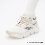 ⁦Reebok Womens' Zig Dynamica 5 Shoes - حذاء ريبوك زيج دايناميكا 5 للنساء لون طحيني وبرتقالي⁩ - الصورة ⁦14⁩