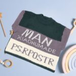 ⁦بلوزة صوف للأطفال لون بنفسجي و أبيض⁩ - الصورة ⁦6⁩