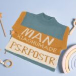 ⁦بلوزة صوف للأطفال لون كموني وأبيض و أزرق فاتح⁩ - الصورة ⁦6⁩