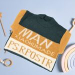 ⁦بلوزة صوف للأطفال لون كموني وكحلي⁩ - الصورة ⁦5⁩