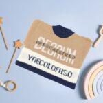 ⁦بلوزة صوف للأطقال لون بيج وكحلي⁩ - الصورة ⁦2⁩